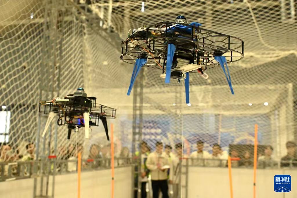 Dual UAV cooperative transport